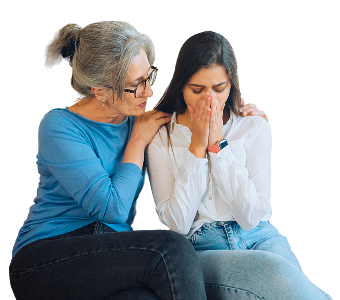 senior holding the shoulder of woman