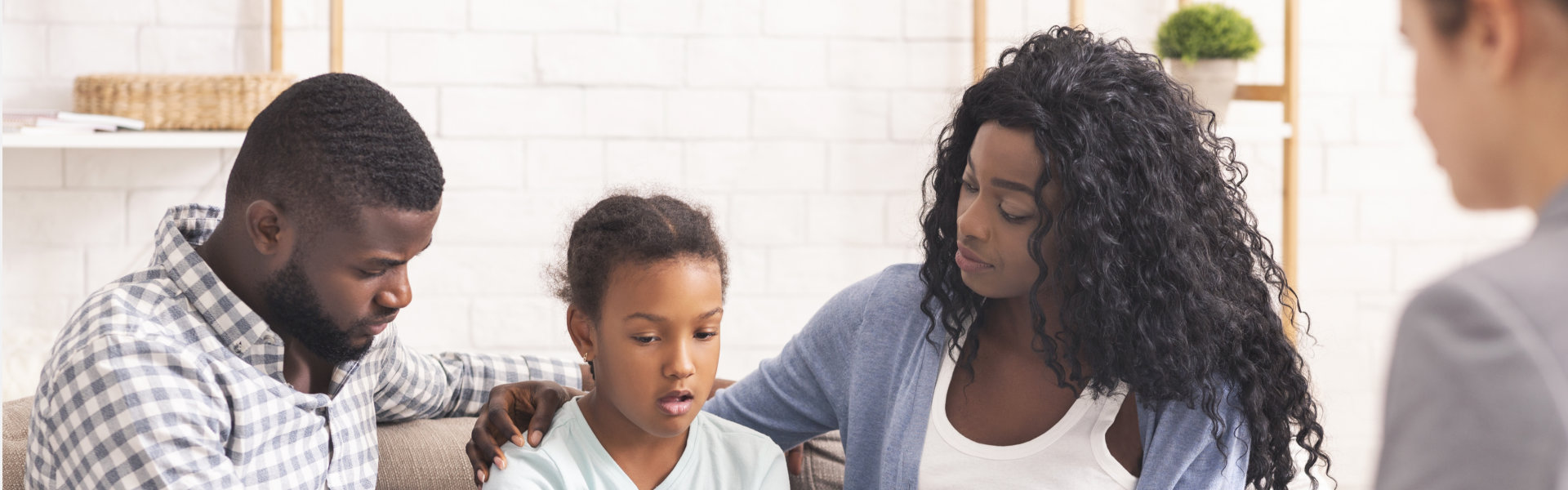 a family talking to their counselor